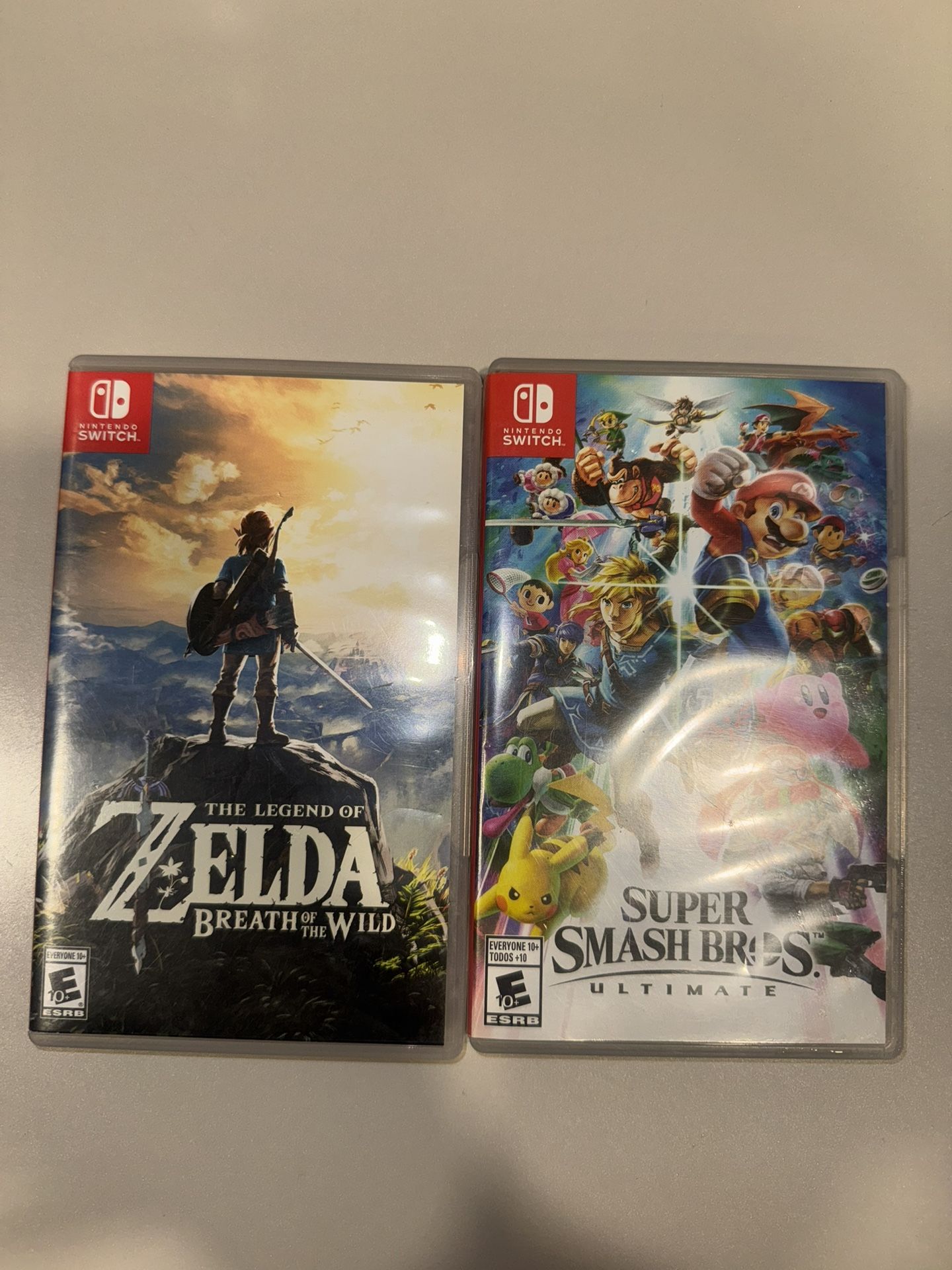 Nintendo Switch Zelda Breath of the Wild and Super Smash Bros Ultimate