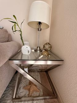 Glass Top End Table with Chrome Base / Ashley furniture