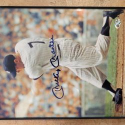 Autographed Mickey Mantle, Ted Williams, and Sandy Koufax pictures with Authentication stamp on photos. 