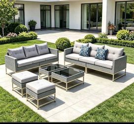 Two 3-seat sofa and 2 ottoman and 2 coffee Tables. Patio furniture sets.  Brand new in box.