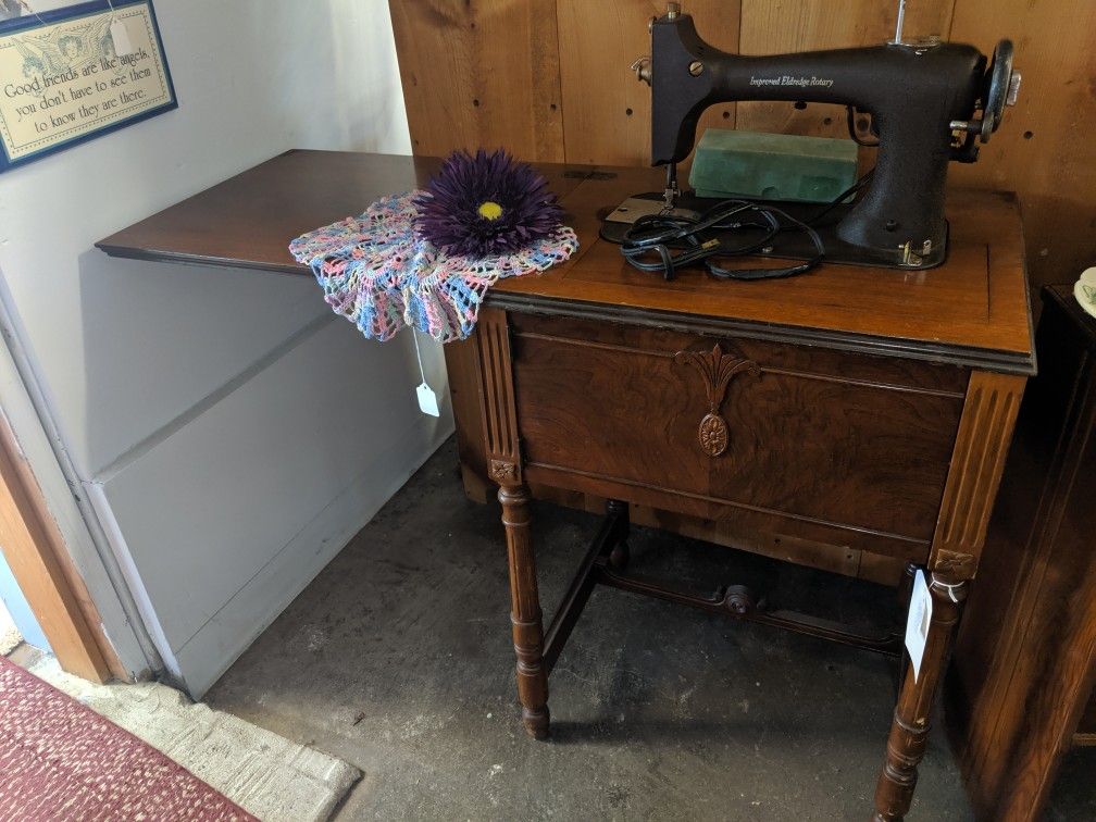 Eldredge rotary antique sewing machine cabinet