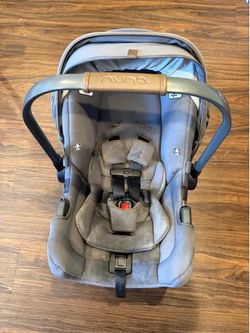 Nuna car seat and 3 bases