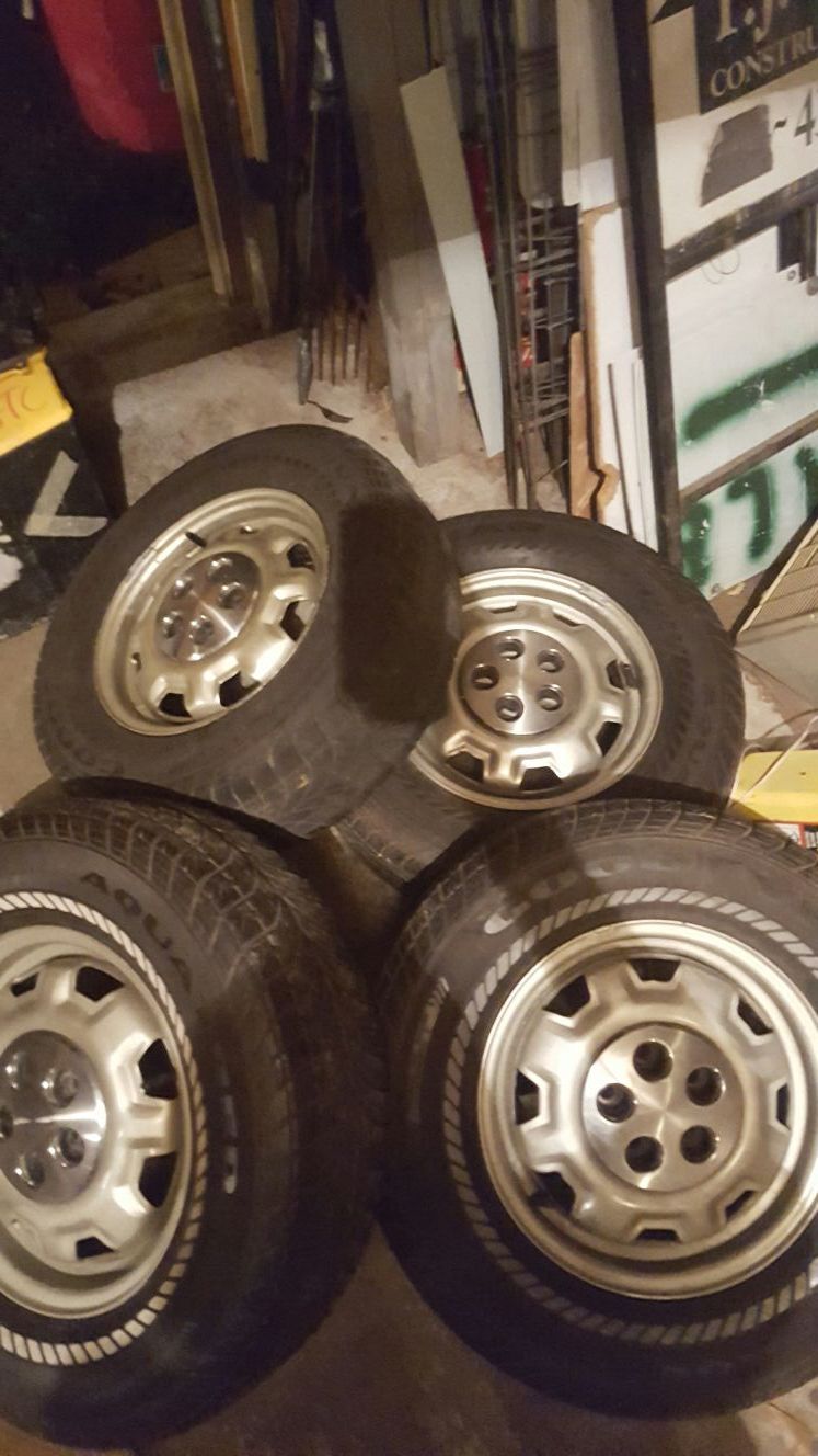 4 good Goodyear aquatred tires and rims