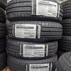 BRAND NEW SET (4) 185 70 14 ALL SEASON TIRES !!!