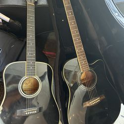 2 Guitars With Cases 