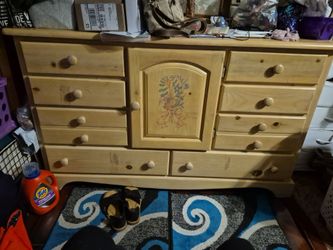 Queen size bedframe, pillow top mattress,and topper, box springs, head board, 11 Drawer dresser,and Matching Airmour....