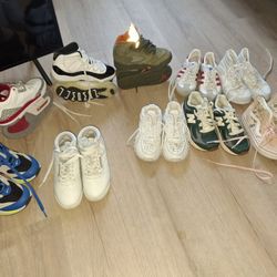 10 pair of kids, shoe size 11 Jordan, New Balance, Vans, Adidas,Puma& Reebox