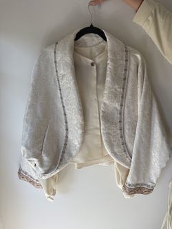 Elegant Beige Textured Jacket with Beaded Trim