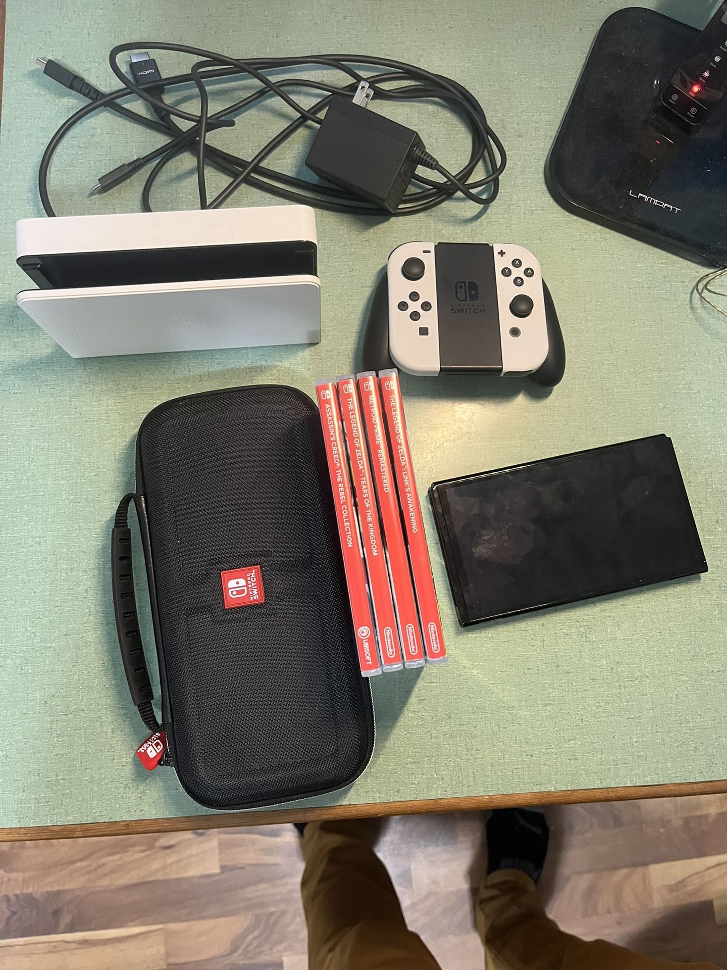 OLED Nintendo Switch w/ 4 Games