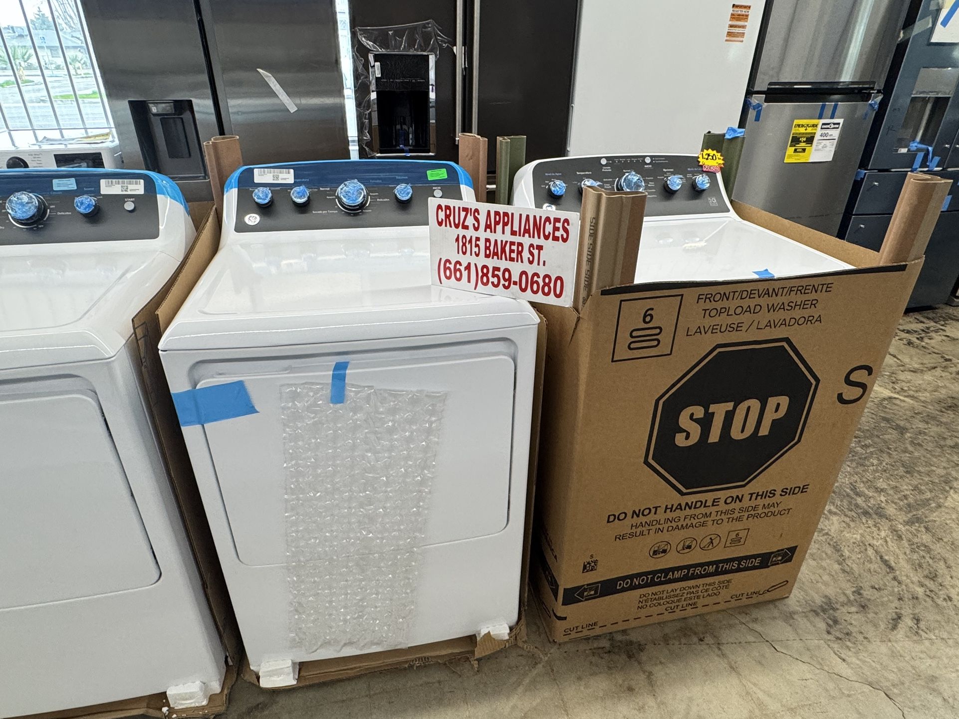 GE 4.5 cu. ft. Capacity Washer with Spanish Panel and Wash Modes Soak and Power & GE 7.2 cu. ft. Capacity Electric Dryer with Spanish Panel and Up To