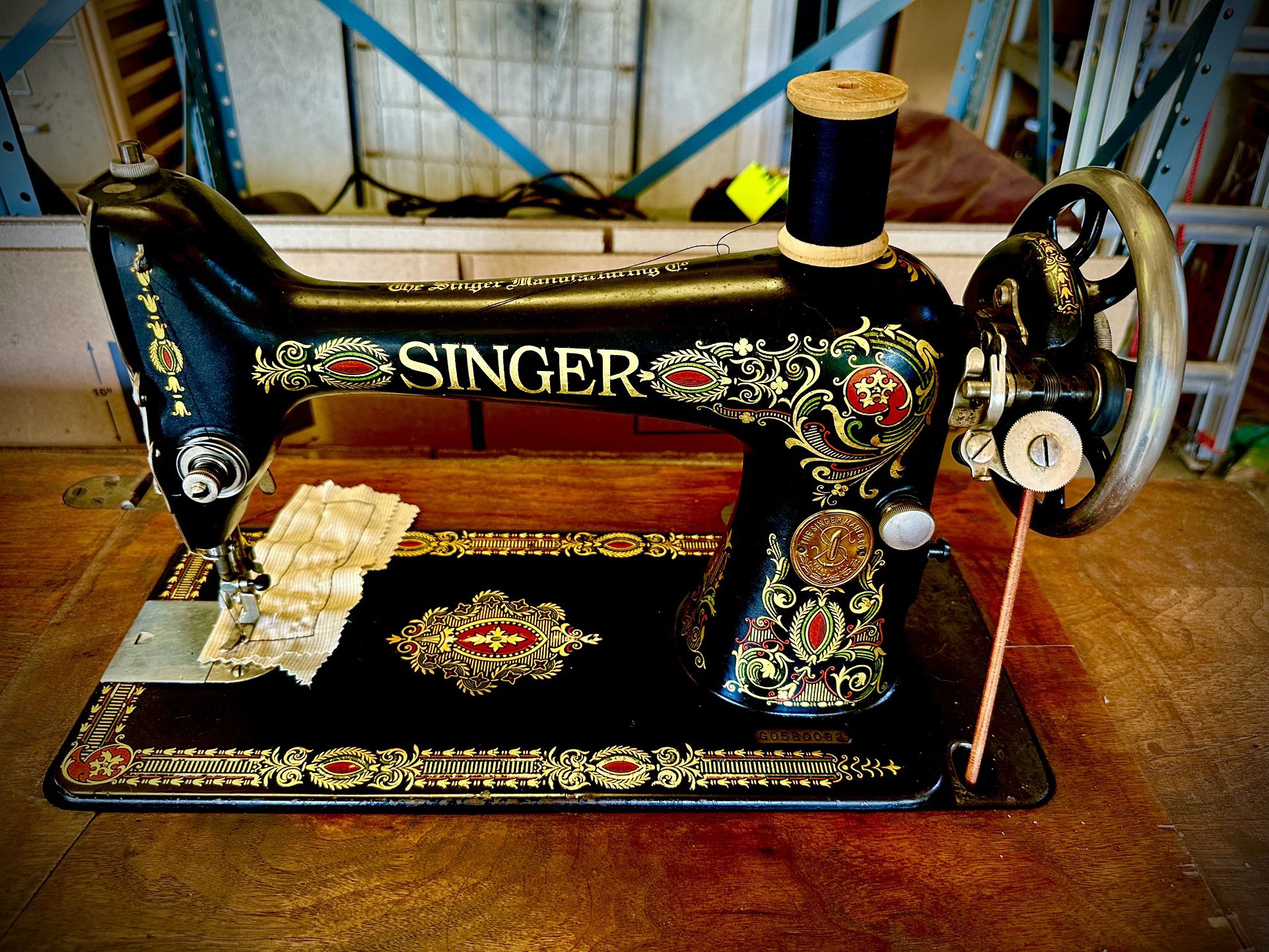1910 Singer "Red Eye" treadle sewing machine.
