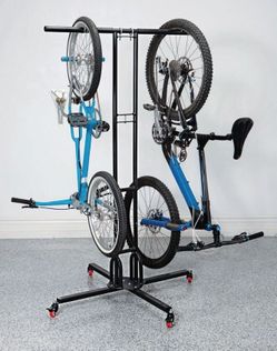 Holds Up to 6 bikes including 29". Mobile has wheels to move around used for only 4 months gotta get rid of it