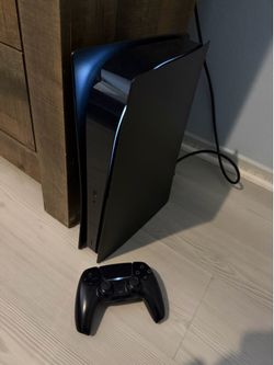 Sony PlayStation 5 (PS5) custom black console with controller like new hardly used.