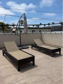 2 Sundeck Chairs with Adjustable wheels and Big umbrella