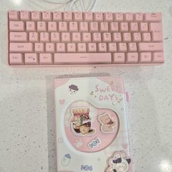 Pink Keyboard And Notebook
