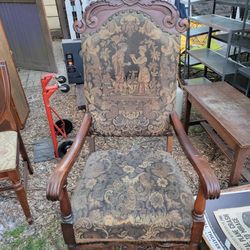 Antique highback upholstered accent chair