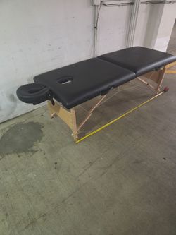 Massage table