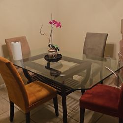 Glass table with chairs