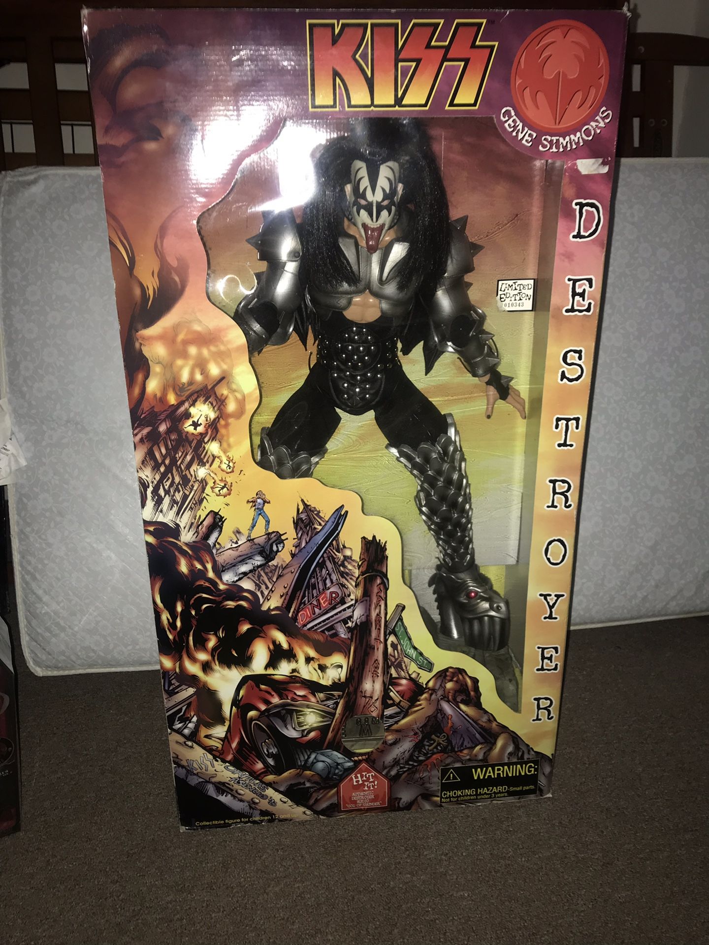 Kiss Gene Simmons collective action figure .. 2 ‘ action figure plays god of thunder. Paid $400 must sell need $$ for new baby.