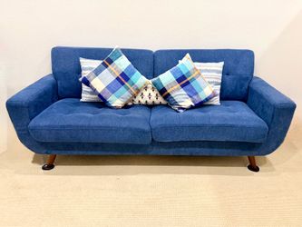 Blue sofa with cushions