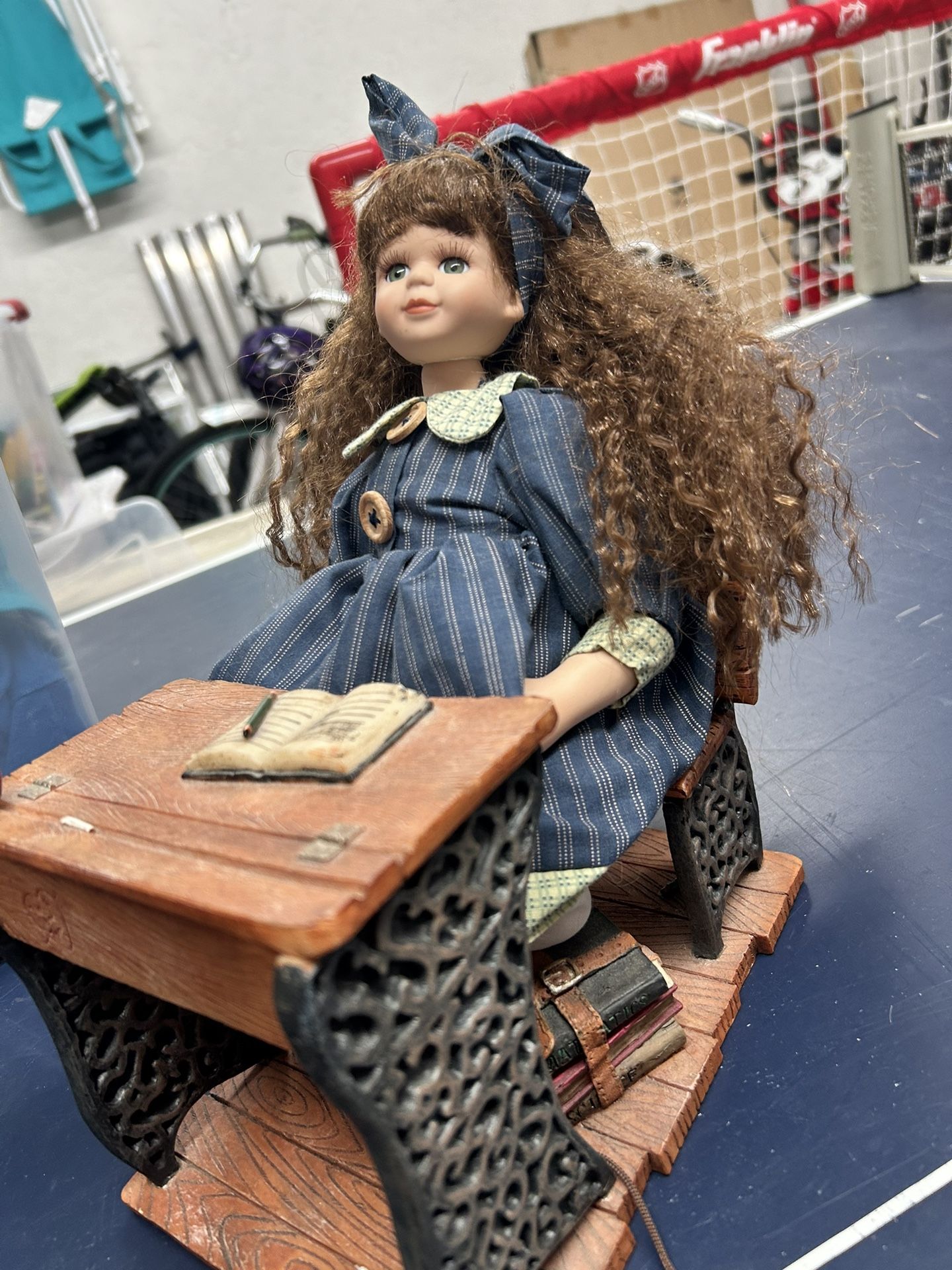 Vintage porcelain doll and school desk 