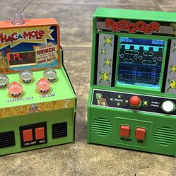 Handheld electronic arcade games Frogger and Whac-A-Mole