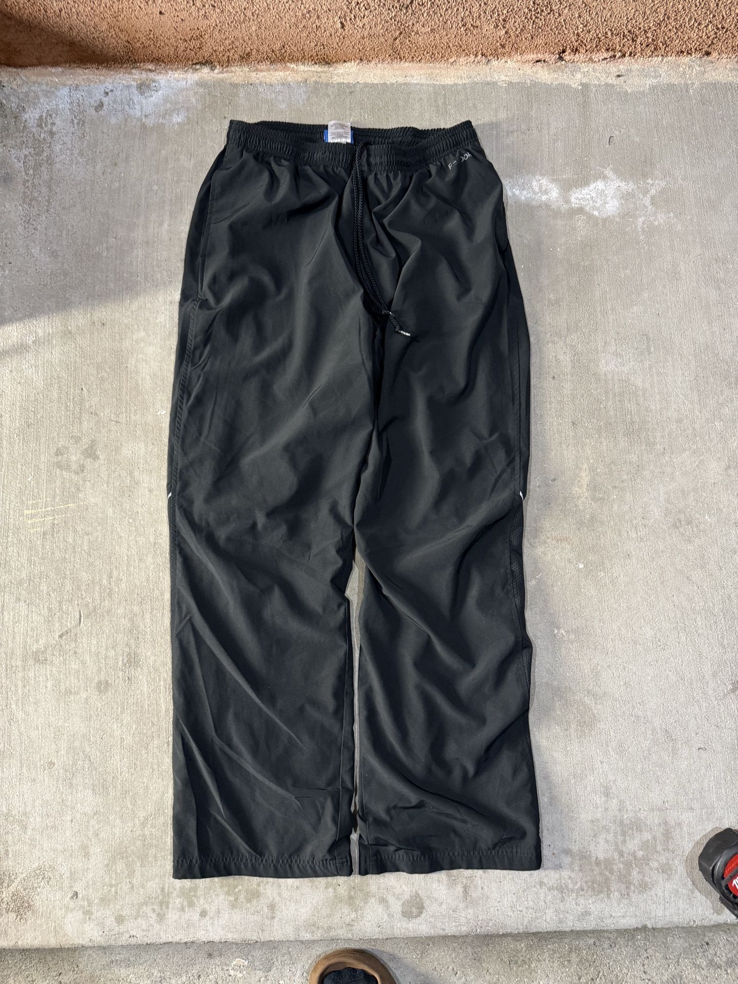 Reebok black track pants with elastic waistband trackpants size large