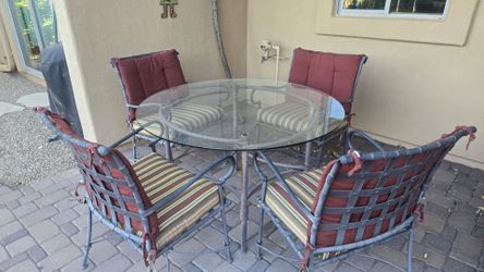 Table and chairs a set of four chairs and glass table