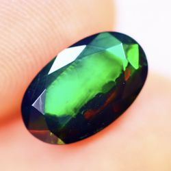 1.58Ct Welo Black Opal Polished - Ethiopian Opal - Oval Faceted