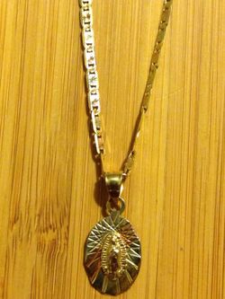 10k solid gold Virgin Mary chain 2mm long 22" grams 6.4