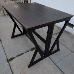  expandable counter-height table 36"H. 48"L. 36"W 