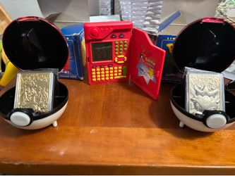 Pokédex, and 23k gold Pokemon cards. Charzard, and togepi
