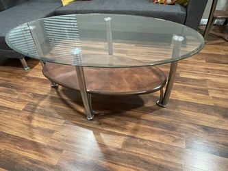 Ashley coffee table with two ends table.