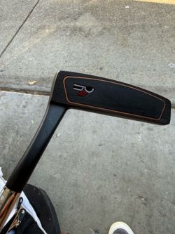 Sub 30 degree putter with head cover