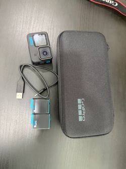 GoPro Action Camera with Case and Batteries
