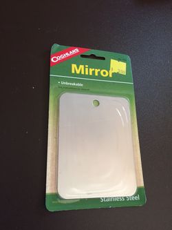 Brand new COGHLANS mirror unbreakable with instructions on the reverse number 714 stainless steel