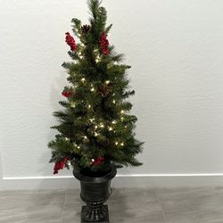 Pre- Lit Christmas Tree In Decorative Urn With Pinecones And Berries