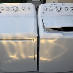 GE washer and gas dryer both used but in new condition