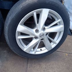 OEM 17" Nissan 5x114.3 Wheels And Tires 