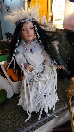Porcelain native dolls alot of them