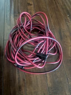 **Heavy Duty 50 FT Extension Cord - Red & Black** **Condition:** Used (Fully Functional) **Product Overview:** Up for sale is a heavy-duty 50-foot ext