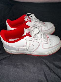 Nike Air Force 1 Lows in the hard-to-find "Contrast Stitch" White and University Red colorway.