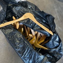 Bag of wooden hangers 