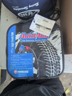 Peerless Auto Trac tire snow chains never used