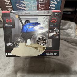 Blue Remote Controlled Thunder Tumbler Rally Car - 360 Spins - Sharper Image Works perfectly