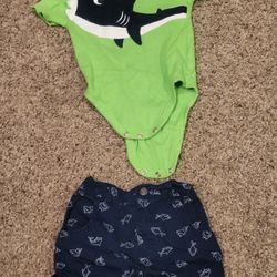 Boys 6-9 months Garanimals lime green shart onesie. Garanimals navy shark print shorts. Items 2. Lot K