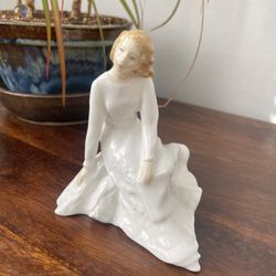 Royal Doulton Porcelain Figurine “Across The Miles”