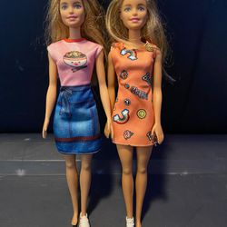 Two Mattel Barbie Dolls