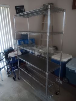 Selling 6 level metal mesh shelf. 6ft 3in high, 4ft wide and 1ft 6in depth. In like new condition.  Selling for $40