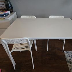 Dining table and three chairs from IKEA